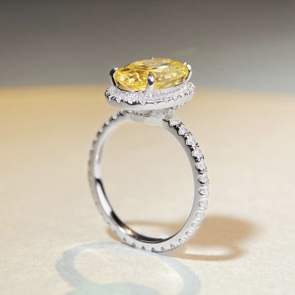 Fancy Yellow Halo Oval Cut Sterling Silver Engagement Ring