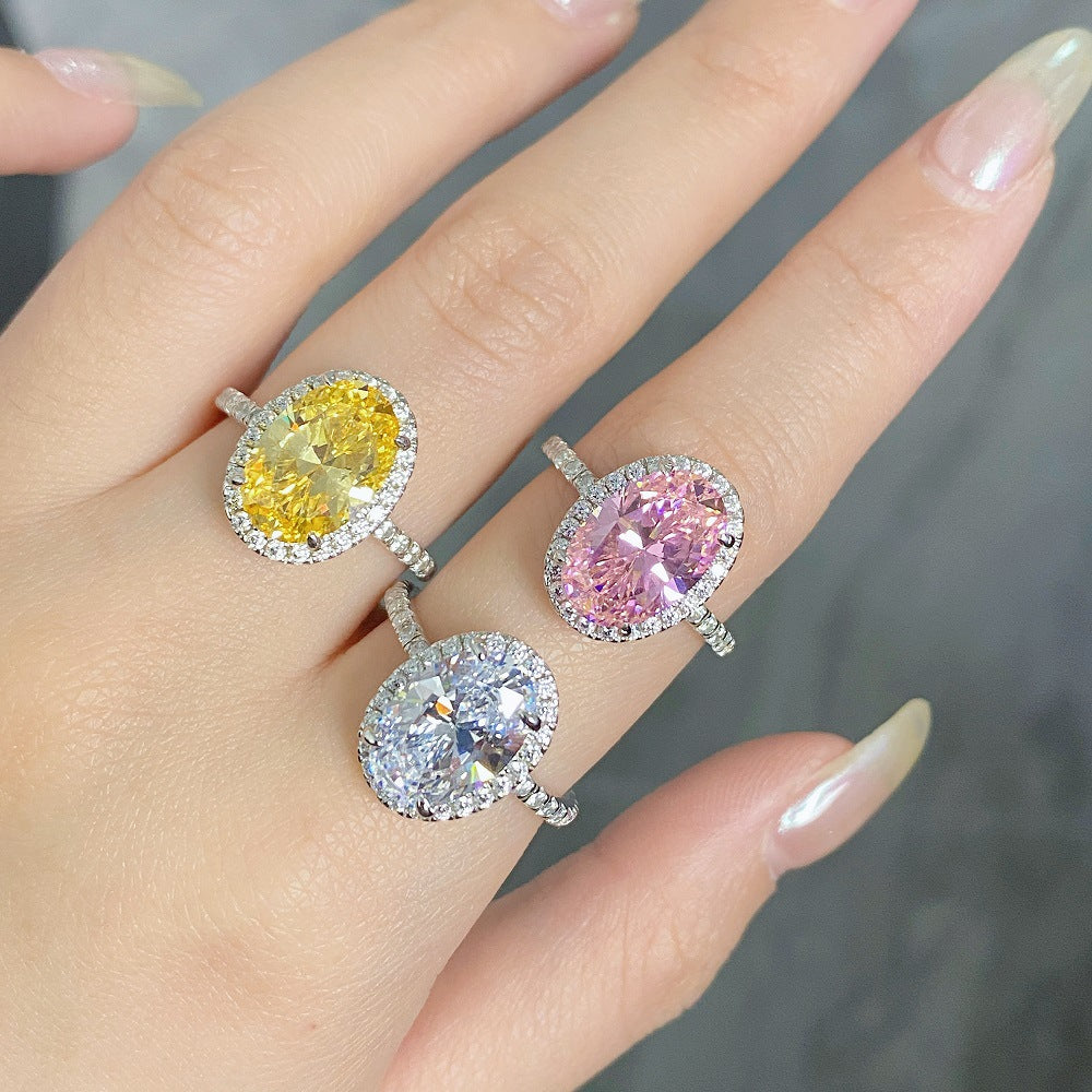 Fancy Yellow Halo Oval Cut Sterling Silver Engagement Ring