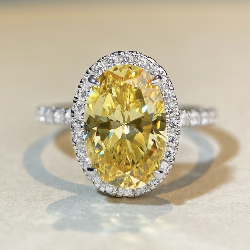 Fancy Yellow Halo Oval Cut Sterling Silver Engagement Ring