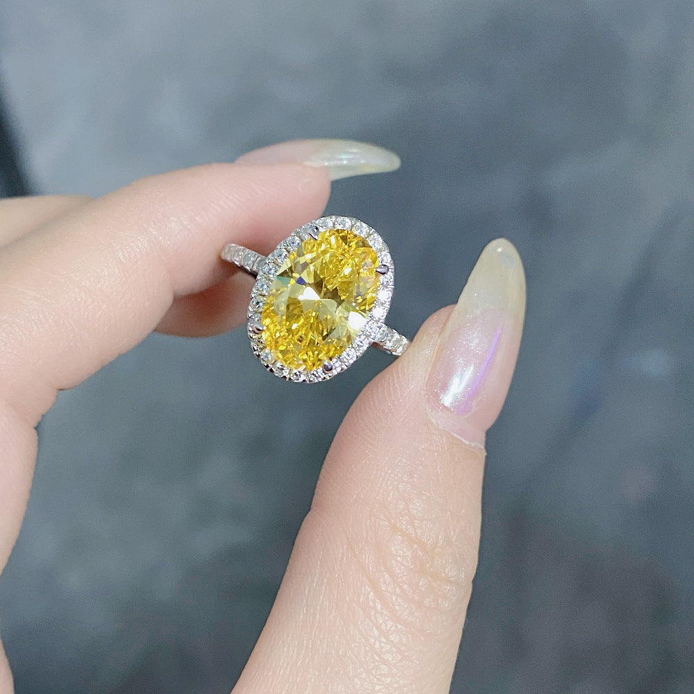 Fancy Yellow Halo Oval Cut Sterling Silver Engagement Ring