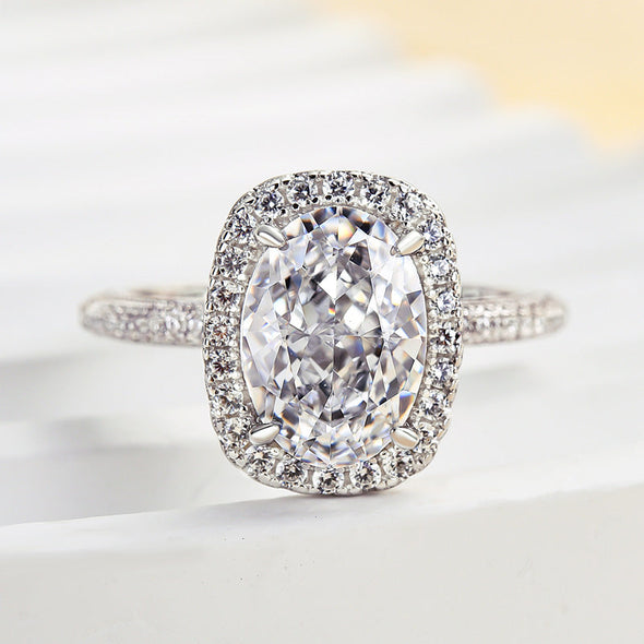 Exquisite Halo Oval Cut Engagement Ring In Sterling Silver