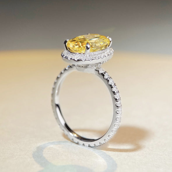Fancy Yellow Halo Oval Cut Sterling Silver Engagement Ring