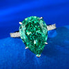 Fancy green Sterling Silver Pear Cut Solitaire Engagement Ring