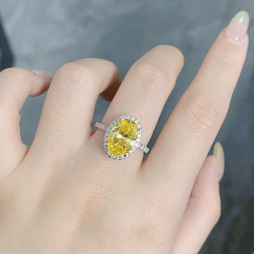 Fancy Yellow Halo Oval Cut Sterling Silver Engagement Ring