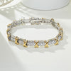 Two Tone X Round Cut Bracelet in Sterling Silver