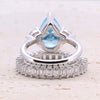 4.0ct Pear Cut Blue Gemstone Engagement ring with Eternity Band
