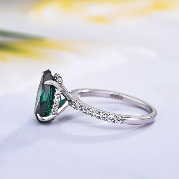 Classic Oval Cut Emerald Green Engagement Ring In Sterling Silver