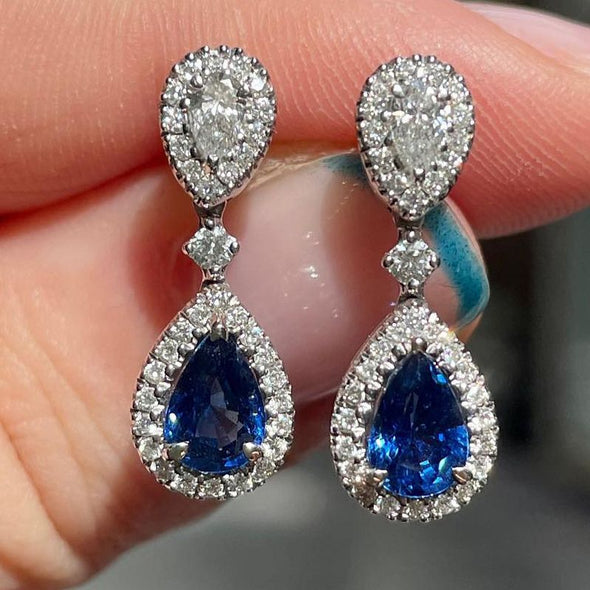 Halo Pear Cut Drop Earrings In Sterling Silver