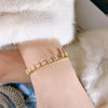 Elegant Golden Tone Pear Cut Droplet Bracelet
