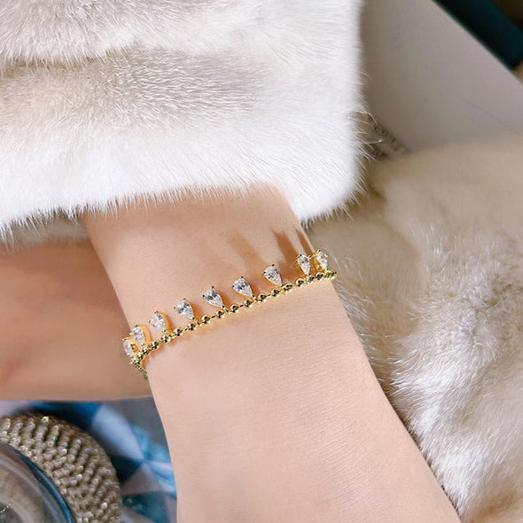 Elegant Golden Tone Pear Cut Droplet Bracelet